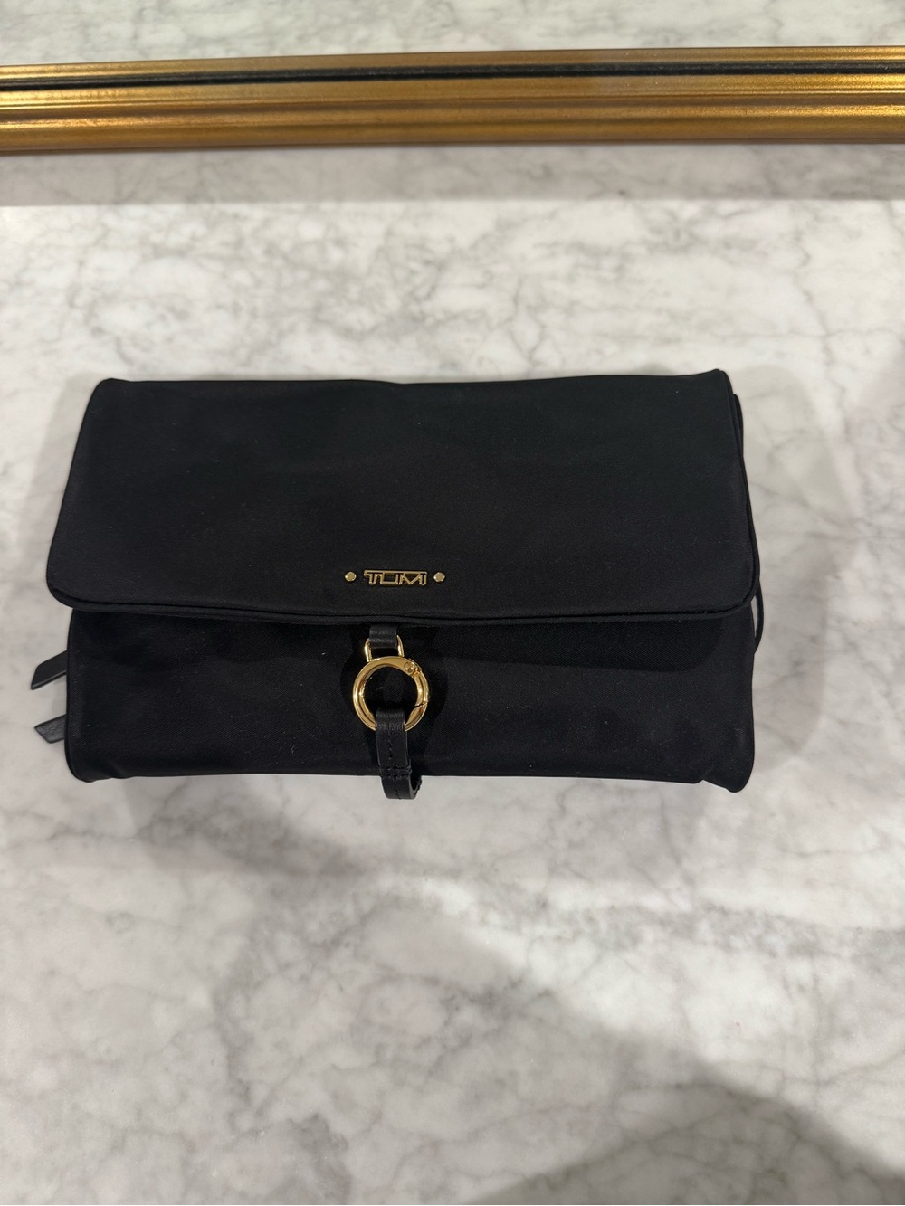 Tumi Black Fold-Over Jewelry Case with Gold Hardware